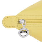 Lieblingstasche Le Pliage One Handtasche S in yellow nylon with leather trim and silver zipper.