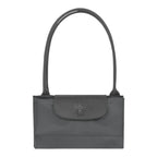 Lieblingstasche Le Pliage One L shoulder bag in dark grey nylon with leather trim and snap closure.