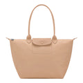 Lieblingstasche Le Pliage One L tote bag in beige leather with a front pocket and snap closure.