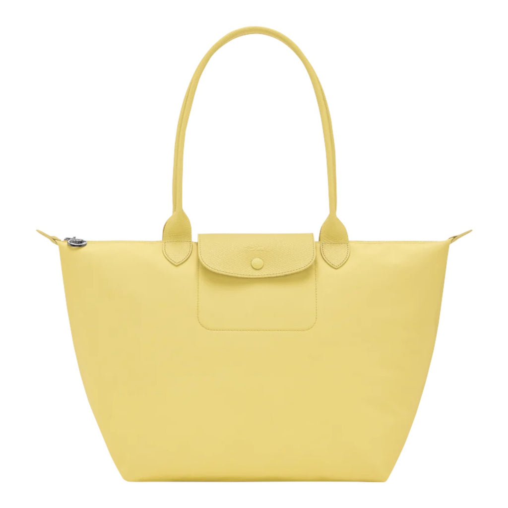 Lieblingstasche Le Pliage One L tote bag in pale yellow leather with a snap-button flap pocket and top handles.