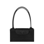 Lieblingstasche Le Pliage One M black nylon shoulder bag with leather trim and snap closure.