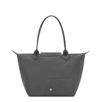 Lieblingstasche Le Pliage One M shoulder bag in grey nylon with leather trim and a snap closure.