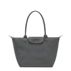 Lieblingstasche Le Pliage One M shoulder bag in grey nylon with leather trim and snap closure pocket.