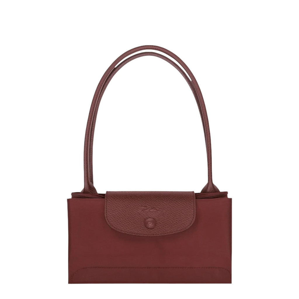 Lieblingstasche Le Pliage One M shoulder bag in red nylon with leather trim and snap closure.