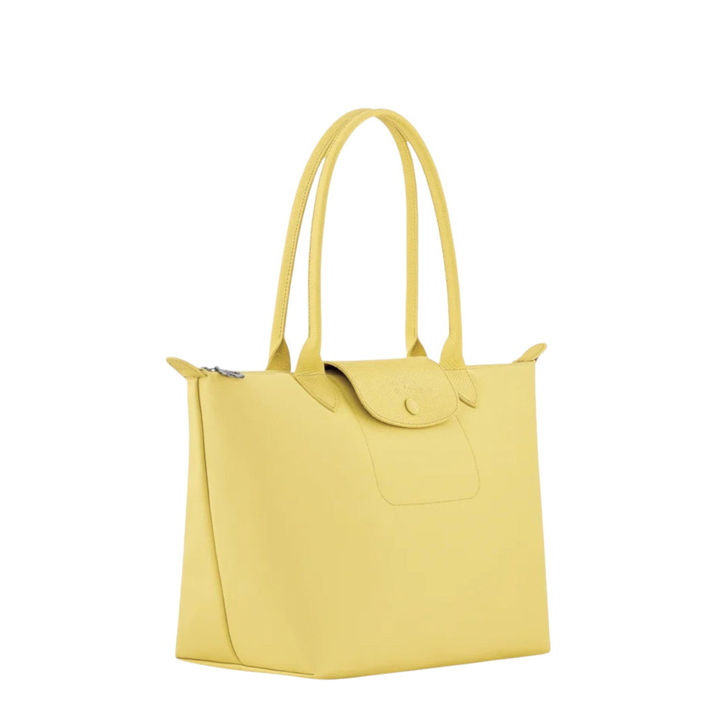 Lieblingstasche Le Pliage One M yellow leather tote bag with snap closure and top handles.