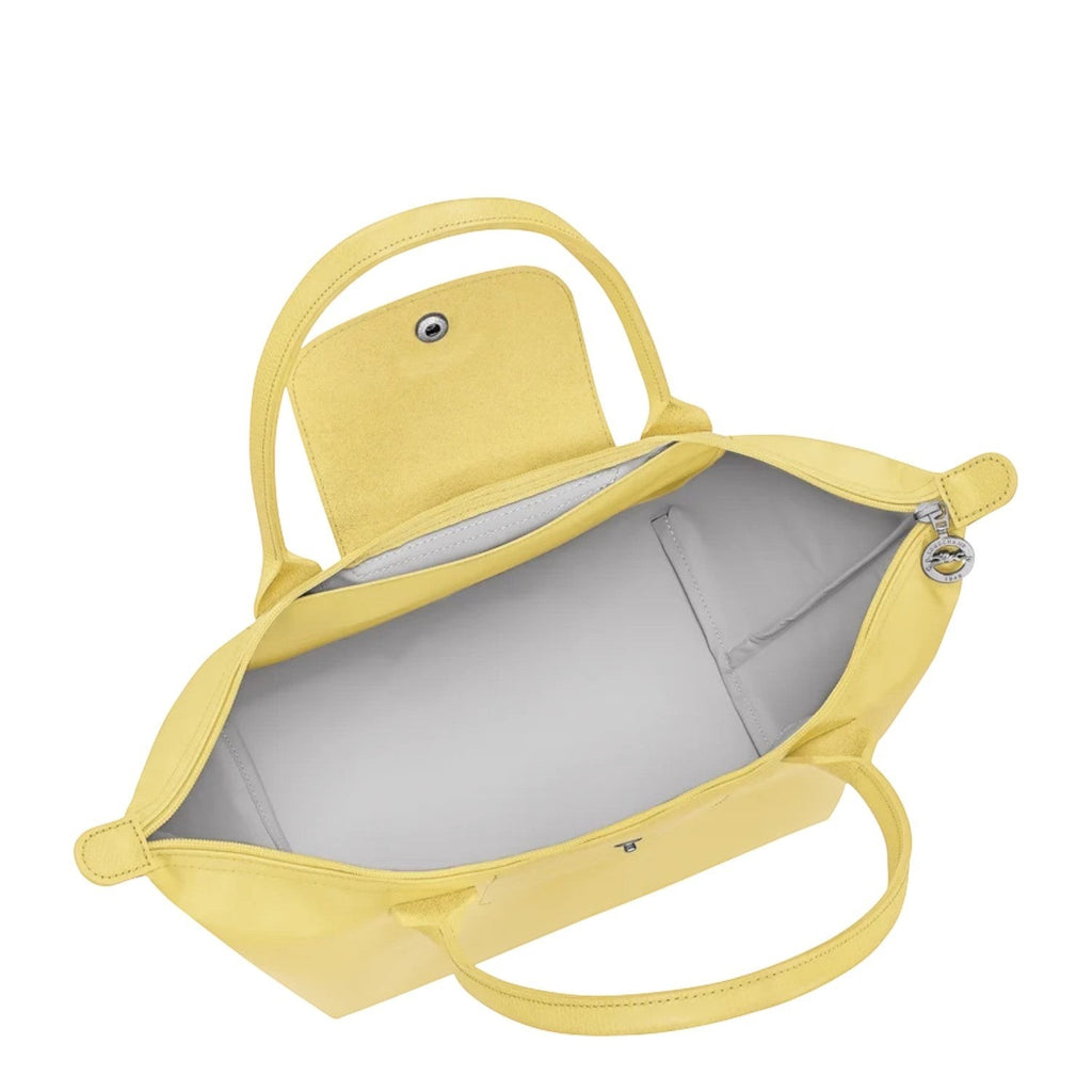 Lieblingstasche Le Pliage One M yellow shoulder bag with leather trim and snap closure.