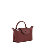 Lieblingstasche Le Pliage One Pochette in burgundy nylon with leather trim and snap closure.