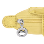 Lieblingstasche Le Pliage One Pochette in yellow nylon with leather trim and a silver horse logo zipper pull.