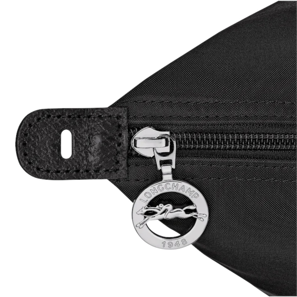Lieblingstasche Le Pliage One Reisetasche L black nylon travel bag with leather trim and silver horse logo zipper pull.