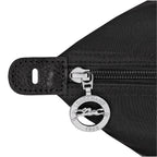 Lieblingstasche Le Pliage One Reisetasche L black nylon travel bag with leather trim and silver horse logo zipper pull.