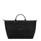 Lieblingstasche Le Pliage One Reisetasche L black nylon travel bag with leather handles and snap closure.