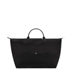 Lieblingstasche Le Pliage One Reisetasche L black nylon travel bag with leather handles and snap closure.