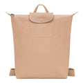 Lieblingstasche Le Pliage One Rucksack in beige nylon with leather flap and snap closure.