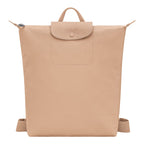 Lieblingstasche Le Pliage One Rucksack in beige nylon with leather flap and snap closure.