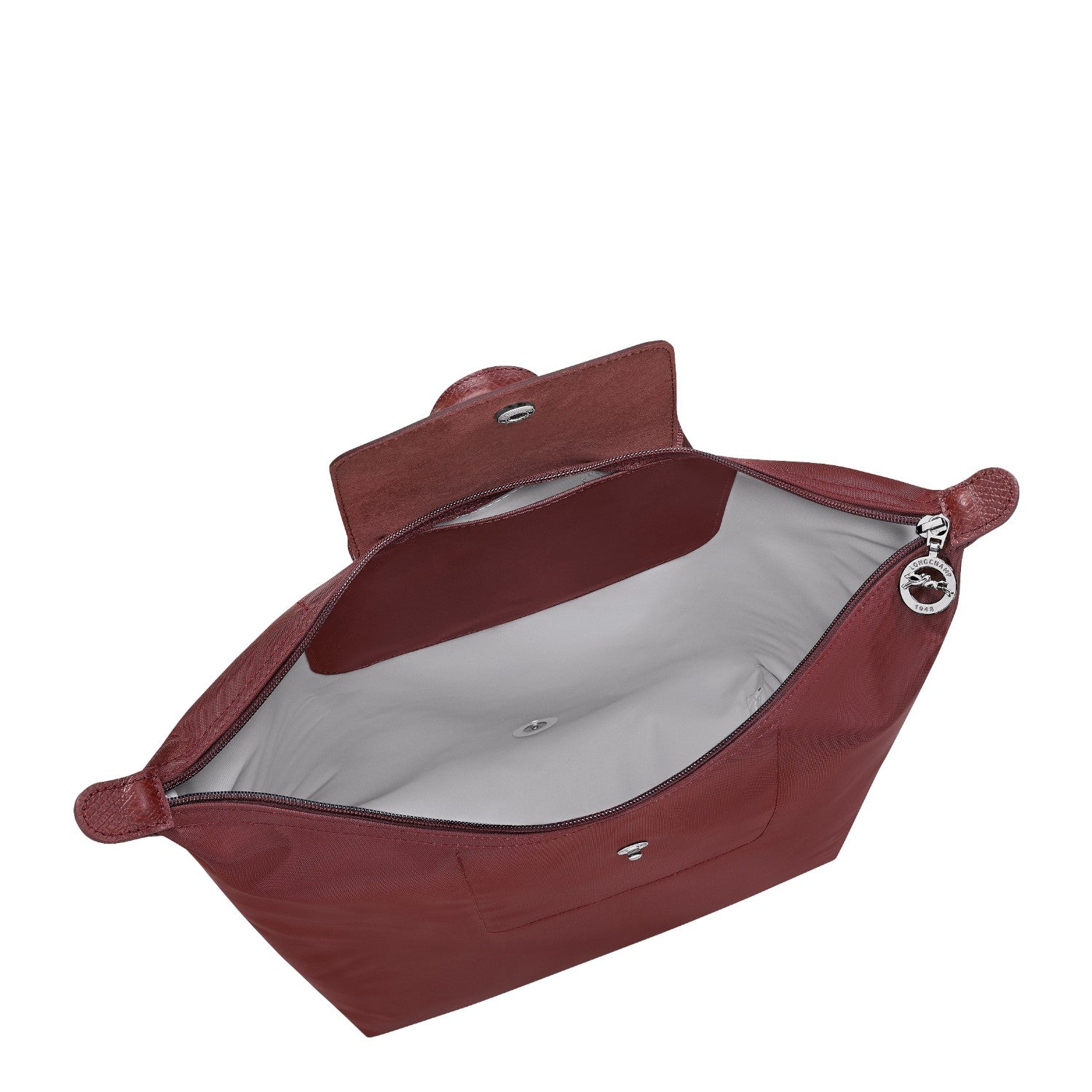 Lieblingstasche Le Pliage One Rucksack in deep red nylon with leather trim and silver hardware.