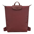 Lieblingstasche Le Pliage One Rucksack in deep red nylon with leather trim and flap closure.