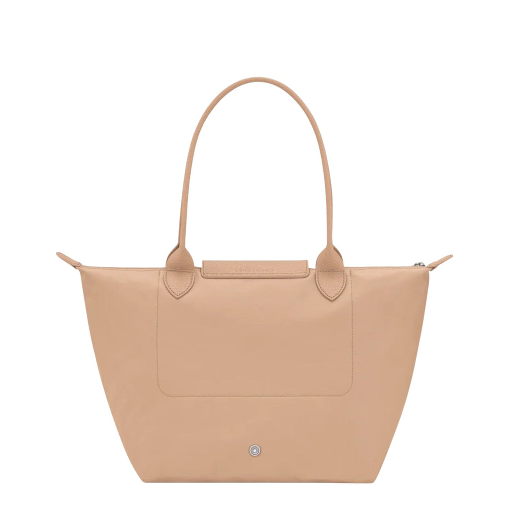 Lieblingstasche Le Pliage One shoulder bag in beige nylon with leather trim and handles. Features a zip closure and front pocket.