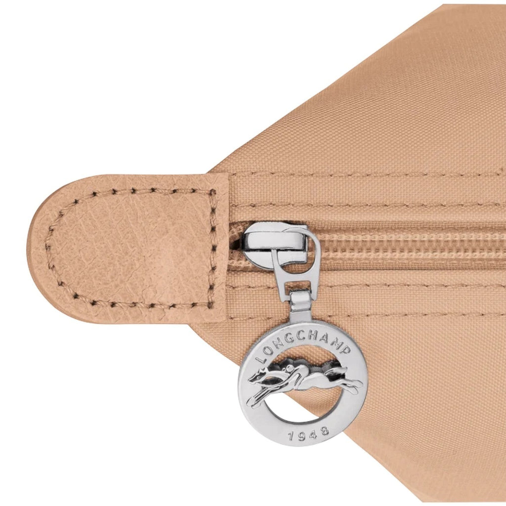 Lieblingstasche Le Pliage One shoulder bag in beige nylon with leather trim and silver zipper charm.