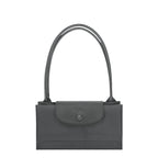Lieblingstasche Le Pliage One shoulder bag in dark grey nylon with leather trim and snap closure.