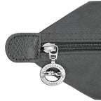 Lieblingstasche Le Pliage One M shoulder bag in dark grey nylon with leather trim and silver zipper with horse logo charm.