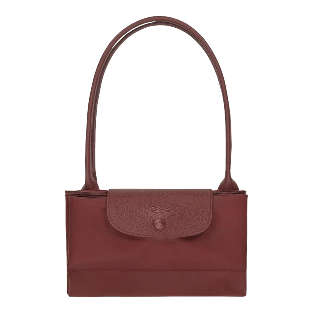 Lieblingstasche Le Pliage One shoulder bag in dark red nylon with leather trim and a snap closure.