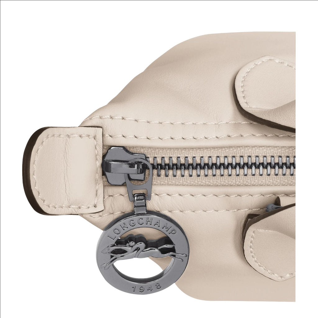 Lieblingstasche Le Pliage Xtra XS handbag in beige smooth cowhide leather with a dark metal logo zipper pull