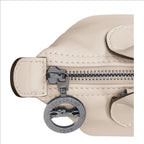 Lieblingstasche Le Pliage Xtra XS handbag in beige smooth cowhide leather with a dark metal logo zipper pull
