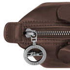 Lieblingstasche Le Pliage Xtra Handtasche XS, brown leather handbag with silver zipper and logo charm.