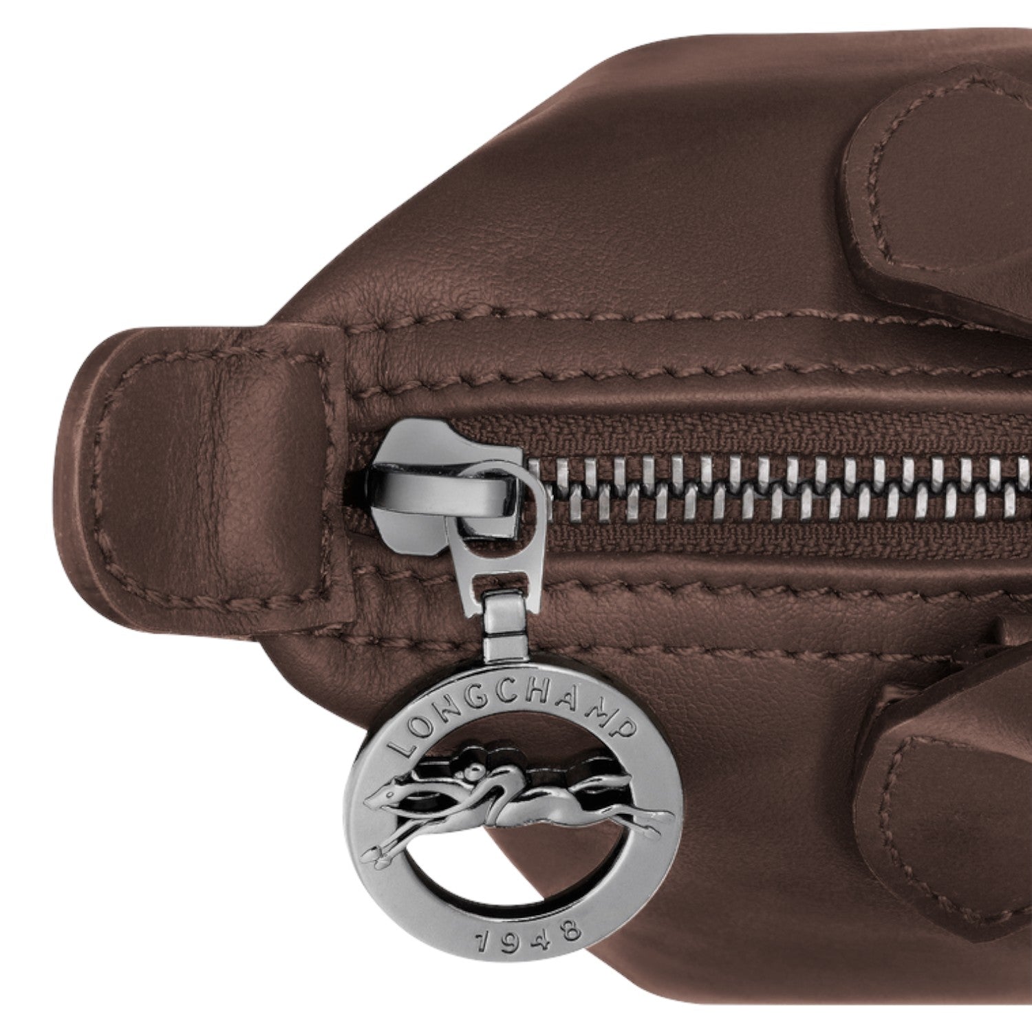 Lieblingstasche Le Pliage Xtra Handtasche XS, brown leather handbag with silver zipper and logo charm.