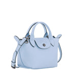 Lieblingstasche Le Pliage Xtra Handtasche XS, a light blue leather handbag with top handles and a detachable shoulder strap.