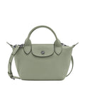 Lieblingstasche Le Pliage Xtra Handtasche XS, a small sage green leather handbag with top handles and a detachable shoulder strap.