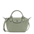 Lieblingstasche Le Pliage Xtra Handtasche XS, a small sage green leather handbag with top handles and a detachable shoulder strap.
