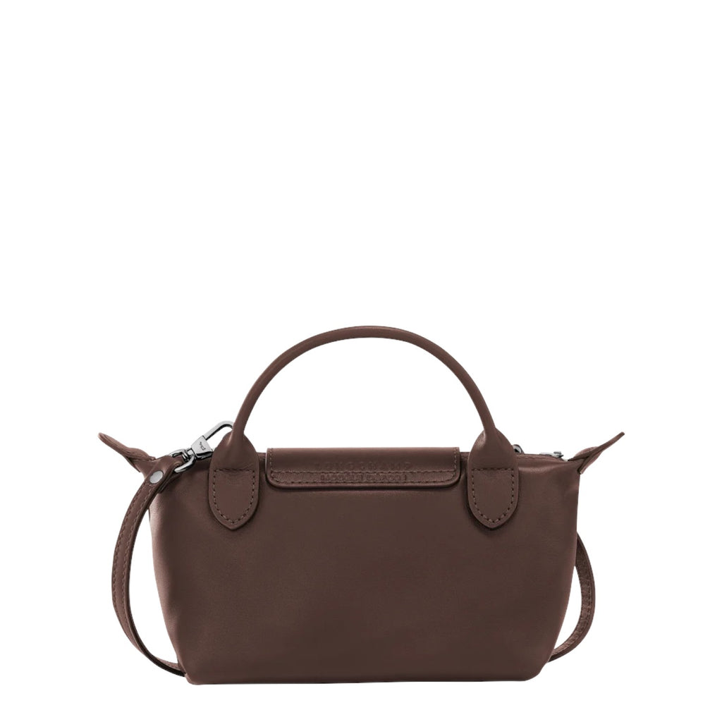 Lieblingstasche Le Pliage Xtra Pochette in brown leather with top handle and crossbody strap.