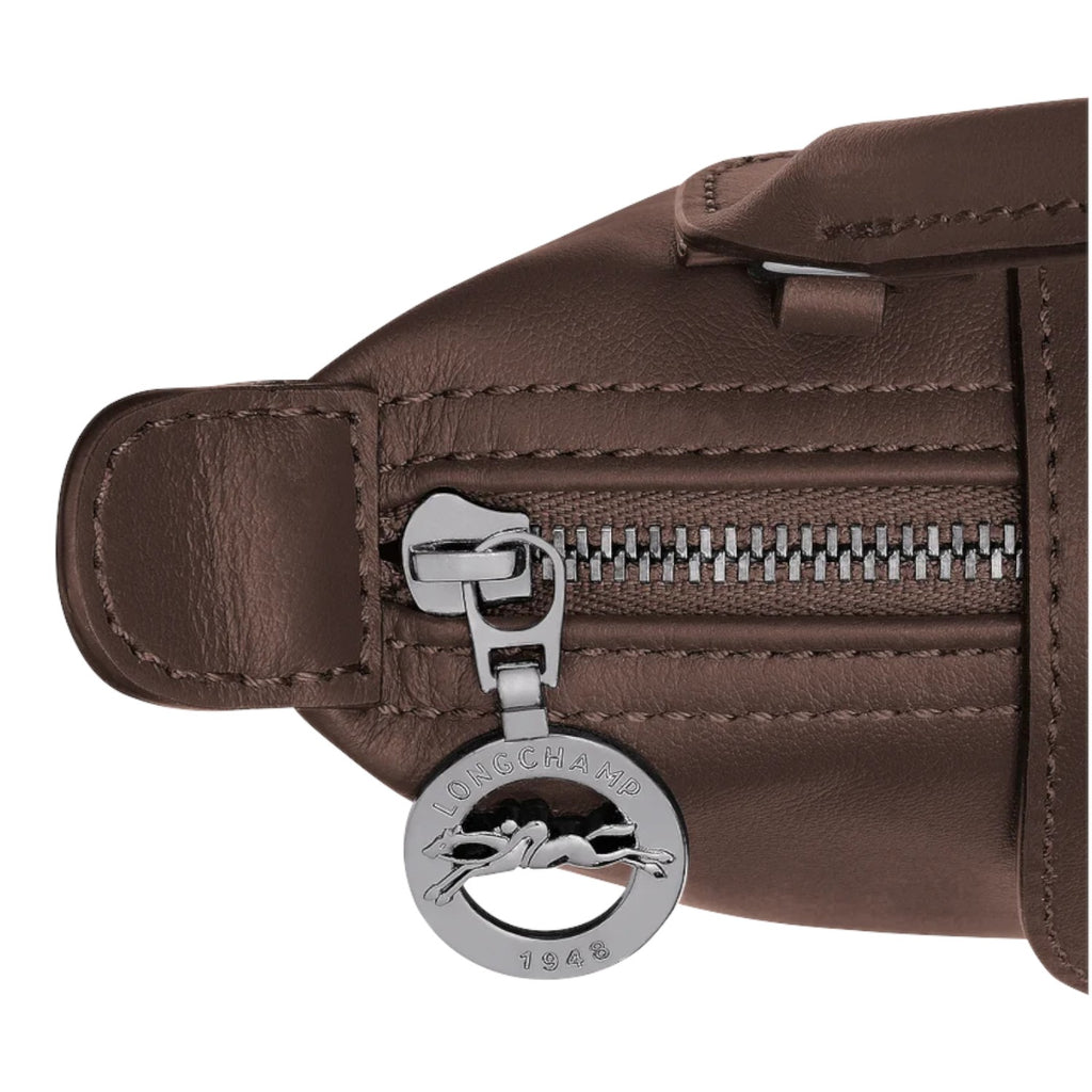 Lieblingstasche Le Pliage Xtra Pochette in brown leather with silver zipper and signature logo charm.