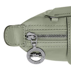 Lieblingstasche Le Pliage Xtra Pochette in light green leather with silver zipper and logo charm.