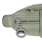 Lieblingstasche Le Pliage Xtra Pochette in light green leather with silver zipper and logo charm.