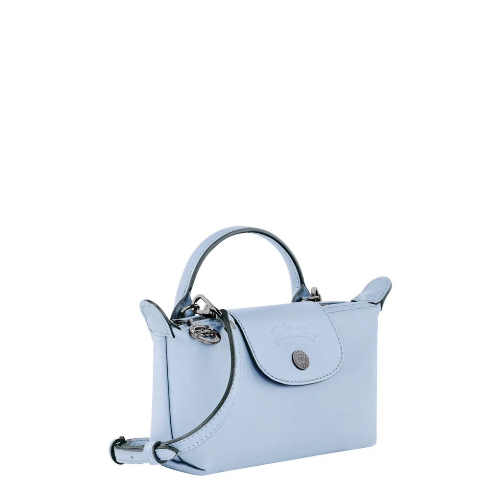 Lieblingstasche Le Pliage Xtra Pochette light blue leather handbag with top handle and crossbody strap.