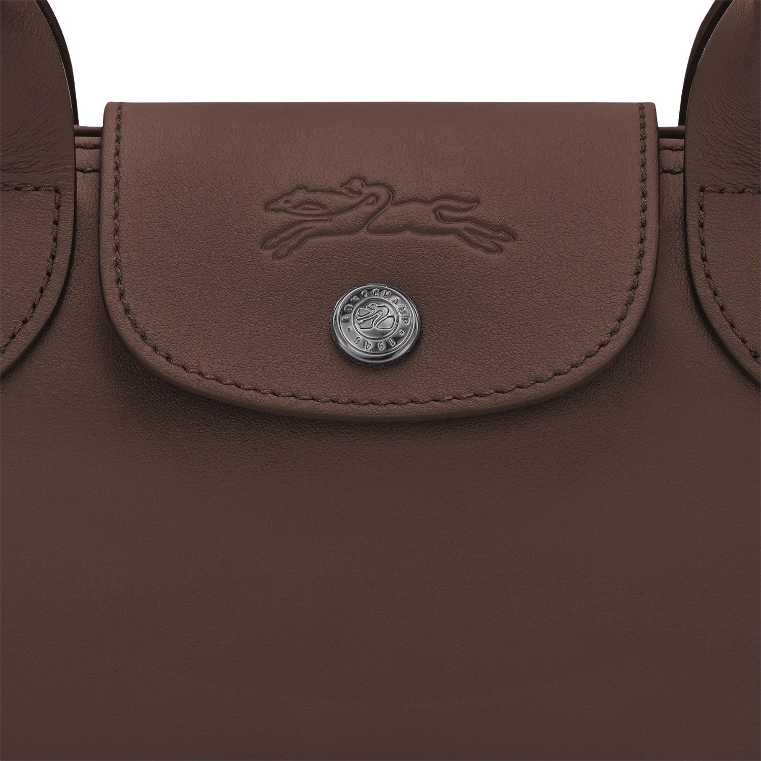 Lieblingstasche Le Pliage Xtra Schultertasche S brown leather shoulder bag with embossed horse logo and snap closure.