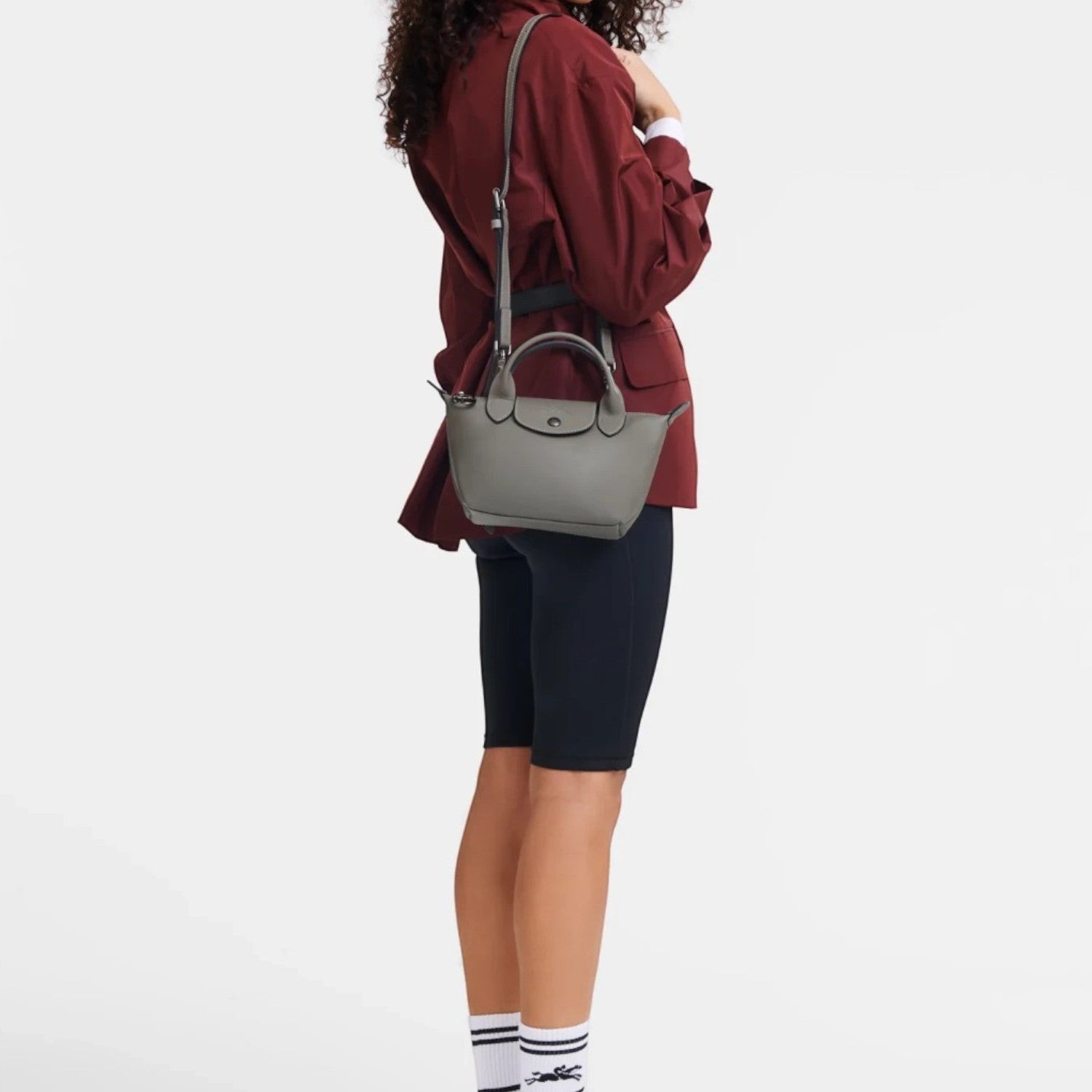 Lieblingstasche Le Pliage Xtra XS handbag in grey smooth cowhide leather worn on the shoulder by a model
