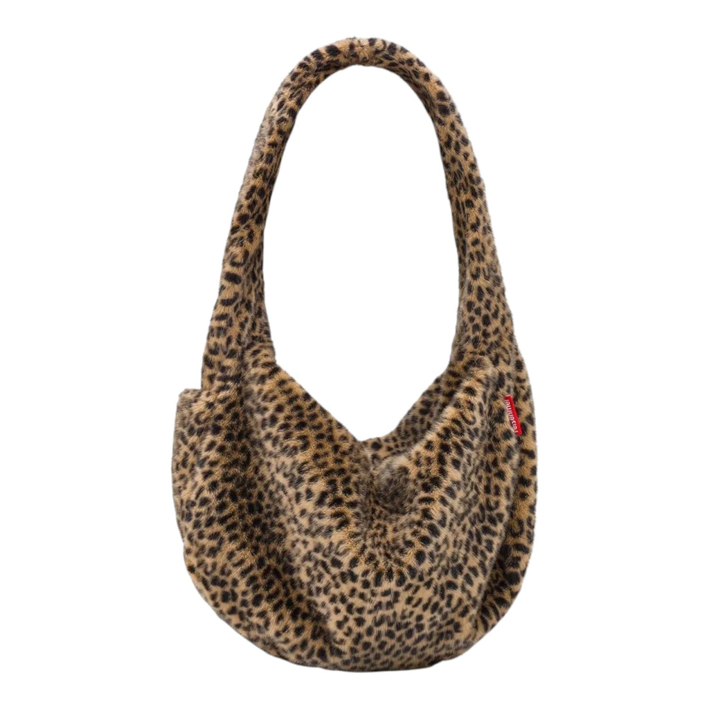 Lieblingstasche Moonbag in a brown and black leopard print faux fur with a soft slouchy crescent shape