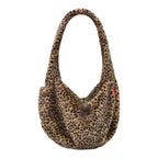 Lieblingstasche Moonbag in a brown and black leopard print faux fur with a soft slouchy crescent shape