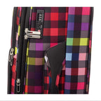 Lieblingstasche Lightstyler Spinner L suitcase featuring a vibrant multi-colored plaid pattern and integrated TSA lock.