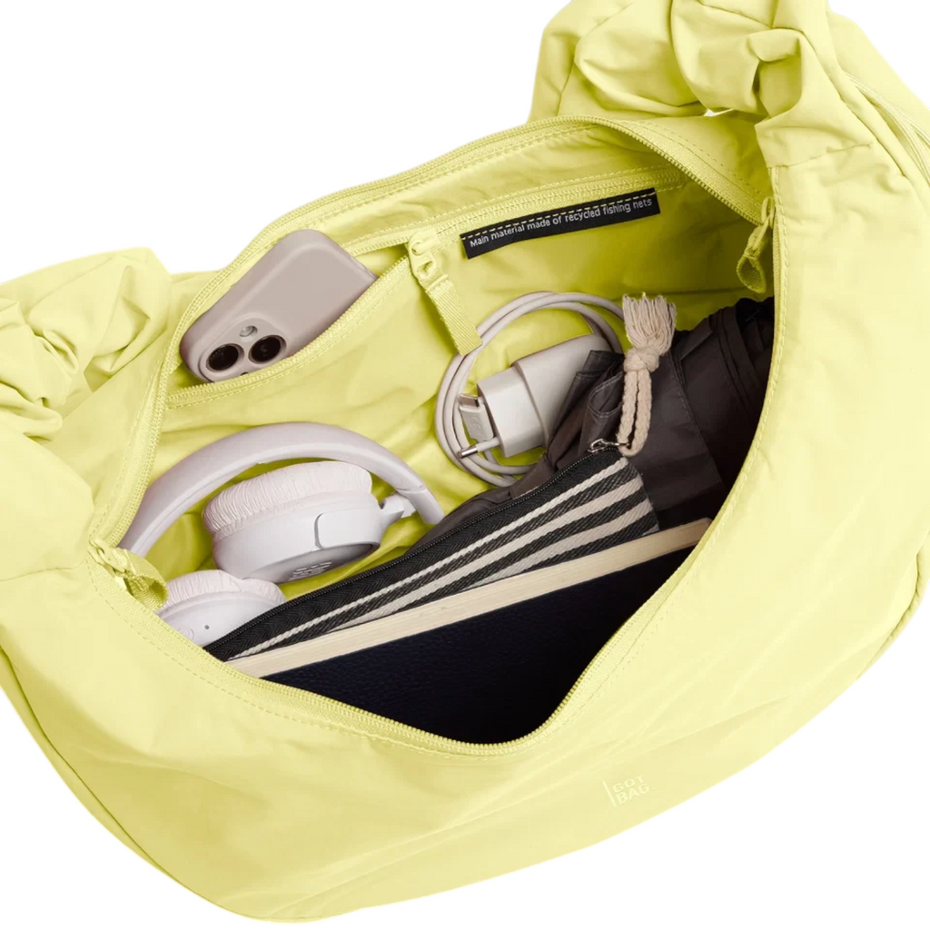 Lieblingstasche Moon Bag Ruffle Large in lime green recycled material with organized interior contents