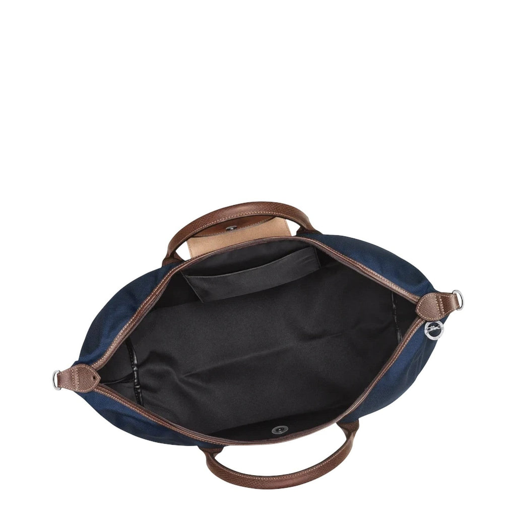 Lieblingstasche Longchamp Boxford travel bag in navy blue with brown leather handles and open interior view