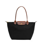 Lieblingstasche Longchamp Le Pliage medium shoulder bag in black nylon with brown leather trim and gold hardware