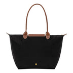 Lieblingstasche Longchamp Le Pliage large black nylon shoulder bag with brown leather handles and gold snap button