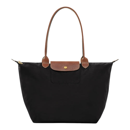 Lieblingstasche Longchamp Le Pliage large black nylon shoulder bag with brown leather handles and gold hardware.