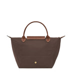 Lieblingstasche Longchamp Le Pliage S handbag in brown nylon with brown leather handles and gold snap button closure.