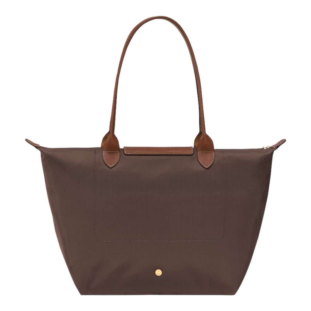 Lieblingstasche Longchamp Le Pliage large brown nylon shoulder bag with tan leather handles and gold snap button.