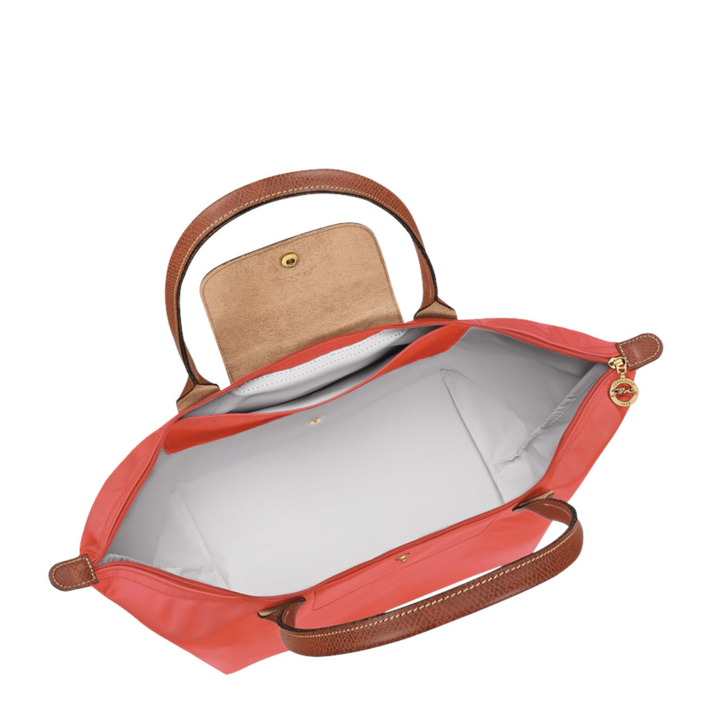 Lieblingstasche Longchamp Le Pliage shoulder bag in coral nylon with brown leather handles and interior view